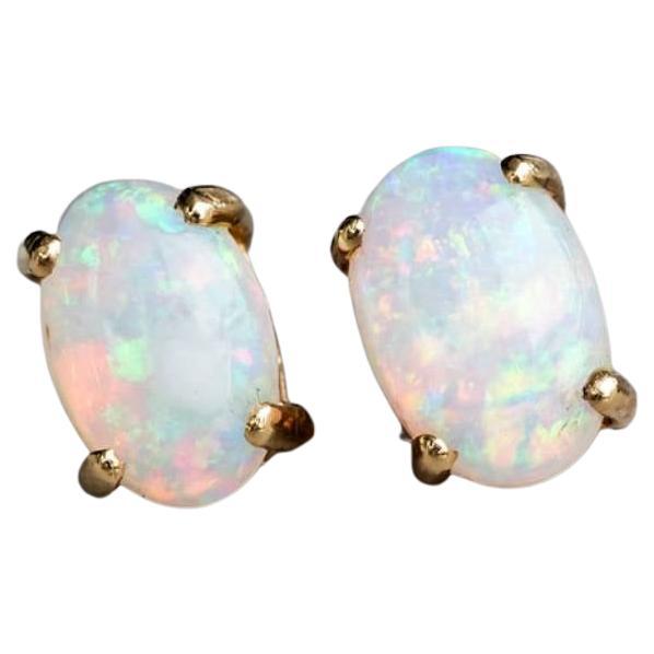 Orecchini con perno di opale australiano solido a forma ovale in oro giallo 14K