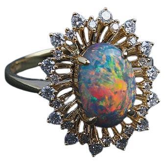 Anello di fidanzamento aureolato con diamante opale nero certificato da 2,26 carati 18 carati in vendita