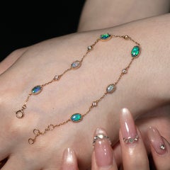 Bracciale in oro 18 carati con opale nero australiano e diamanti