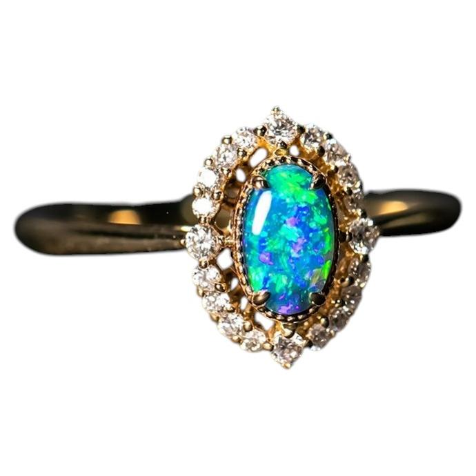 Bright Blue Engagement Ring: Australian Black Opal and Diamond in 14K For Sale