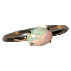 14K Yellow Gold Engagement Ring featuring an Oval Ethiopian Opal