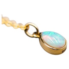 Birnenförmige australische massive Opal-Halskette 14k Gelbgold