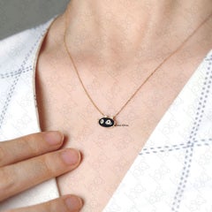 Collier mystique de chat noir en or 14K avec yeux en tsavorite et diamant