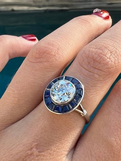 Anillo Art Déco con diamante de 2,04 ct con corte europeo antiguo y zafiro, certificado por el GIA