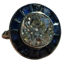 Anillo Art Déco con diamante de 2,04 ct con corte europeo antiguo y zafiro, certificado por el GIA