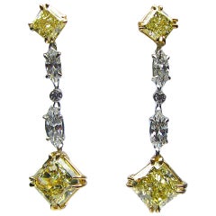 GIA Certified Fancy Yellow Radiant Cut Diamonds and Yellow Gold Drop Earrings