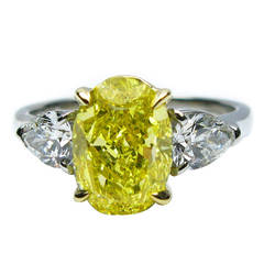 2.50 Carat Fancy Intense Yellow Oval Diamond Ring