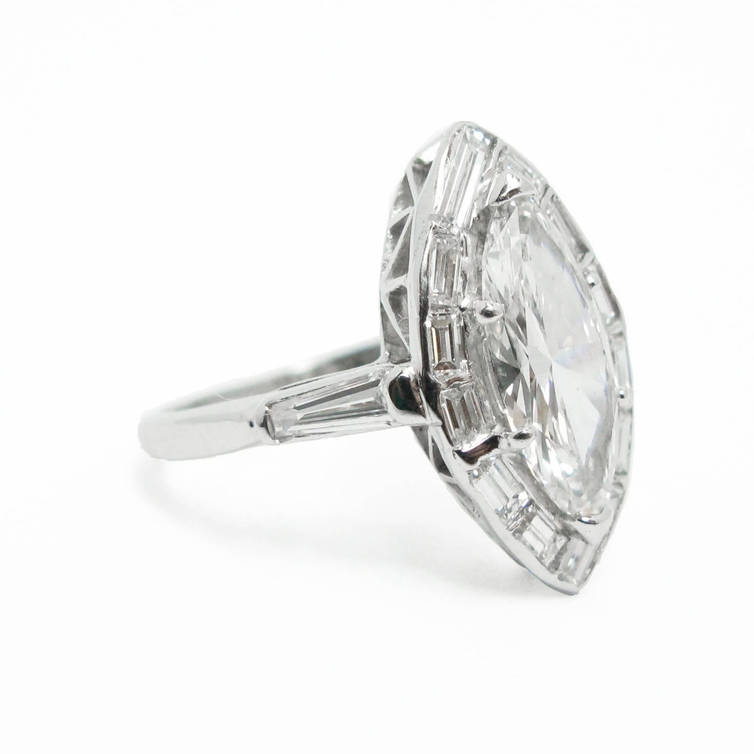 marquise diamond ring with halo and baguettes
