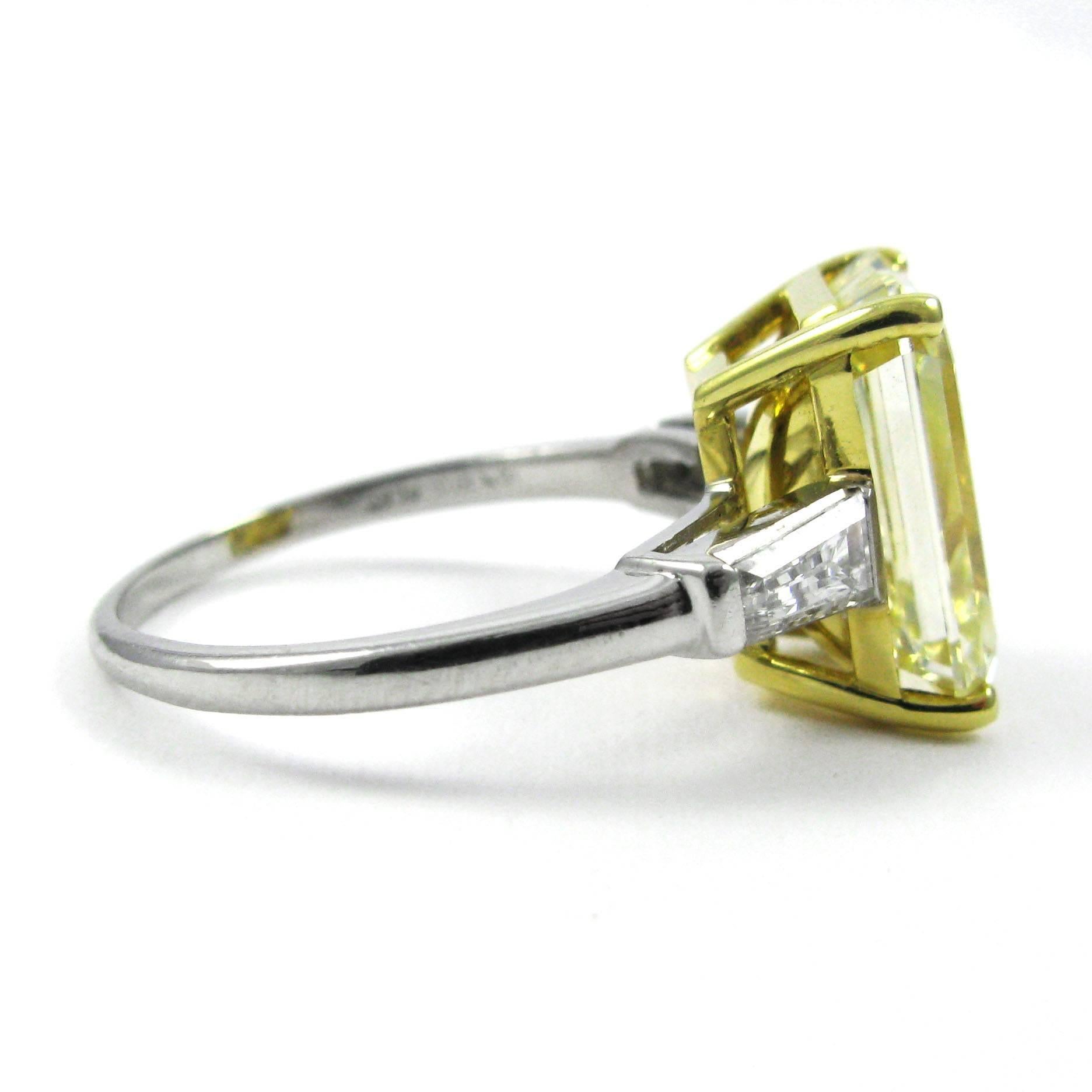 yellow diamond emerald cut engagement ring