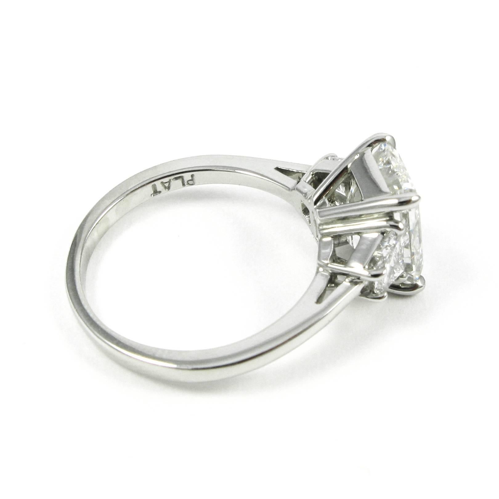 Women's 3.21 Carat GIA Emerald Cut Diamond Platinum Three-Stone Ring