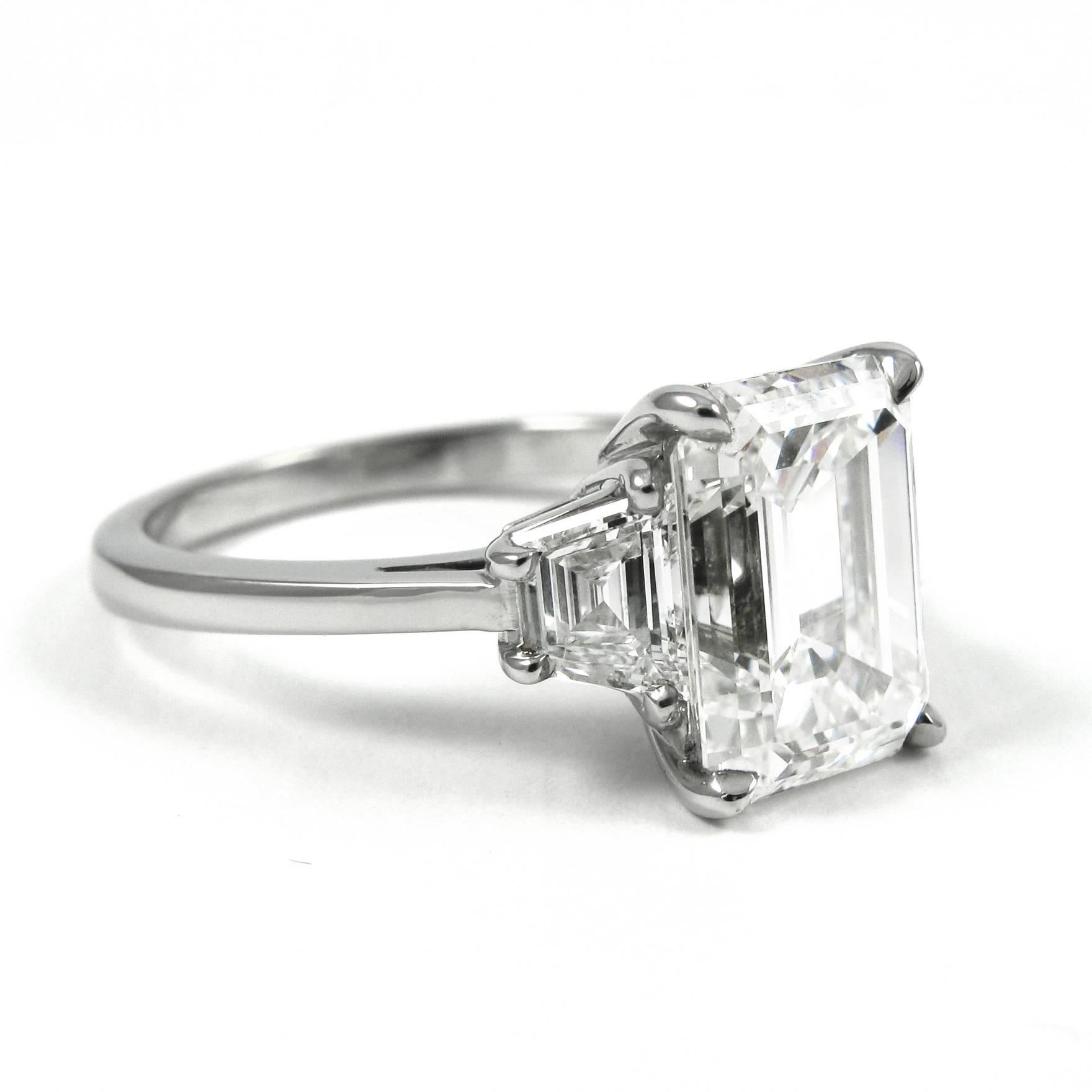 3.21 Carat GIA Emerald Cut Diamond Platinum Three-Stone Ring In Excellent Condition In New York, NY