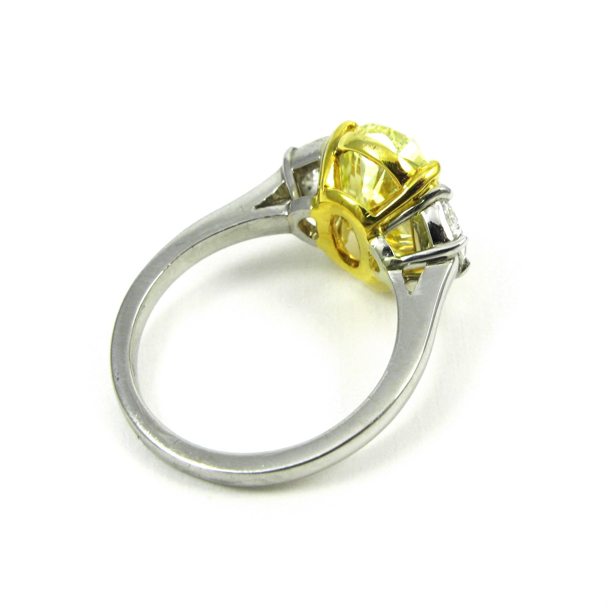 Stunning GIA Certified 4.61 Carat Fancy Intense Yellow Oval Diamond Ring 1