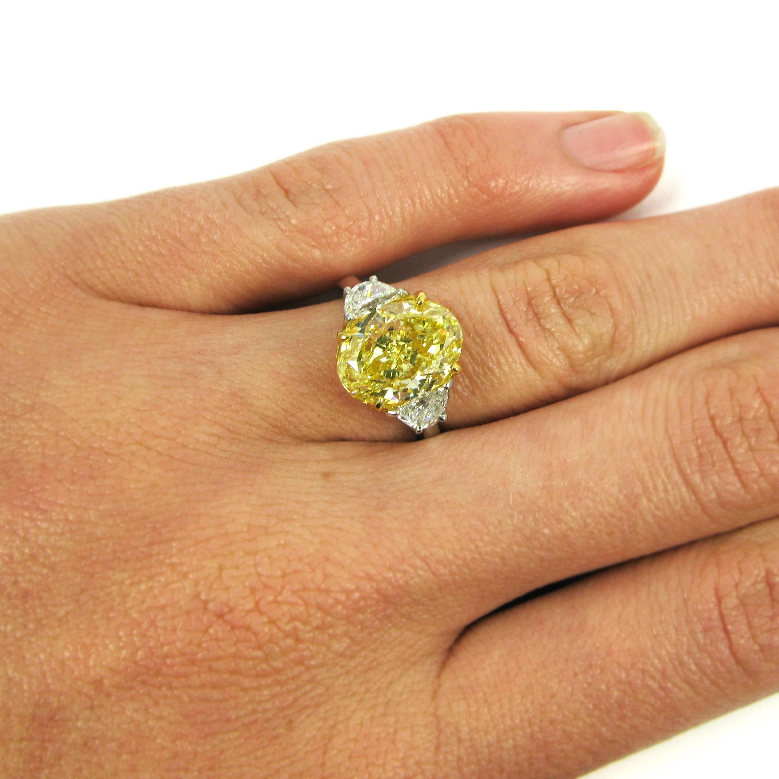 Stunning GIA Certified 4.61 Carat Fancy Intense Yellow Oval Diamond Ring 2