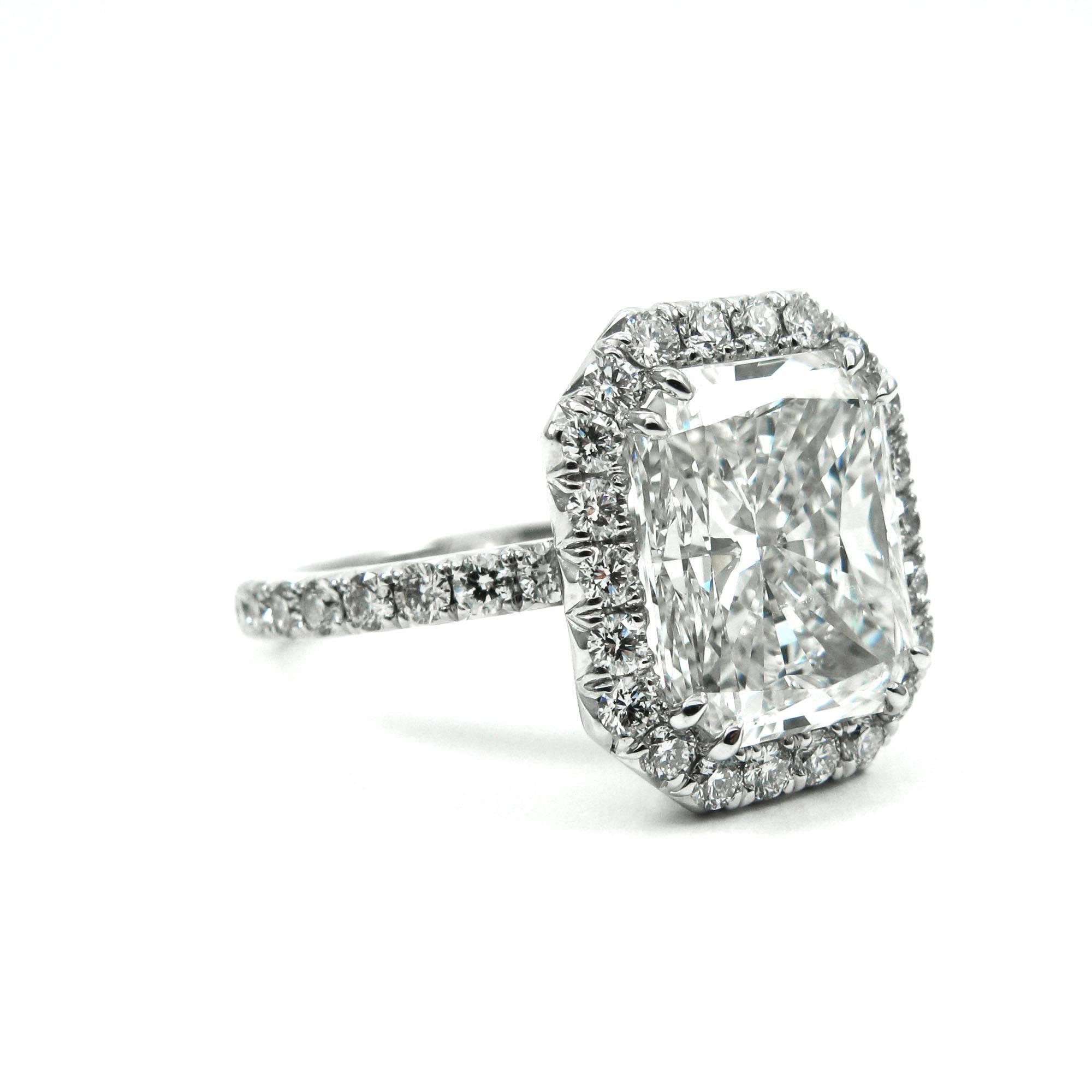 elongated radiant cut diamond ring with halo
