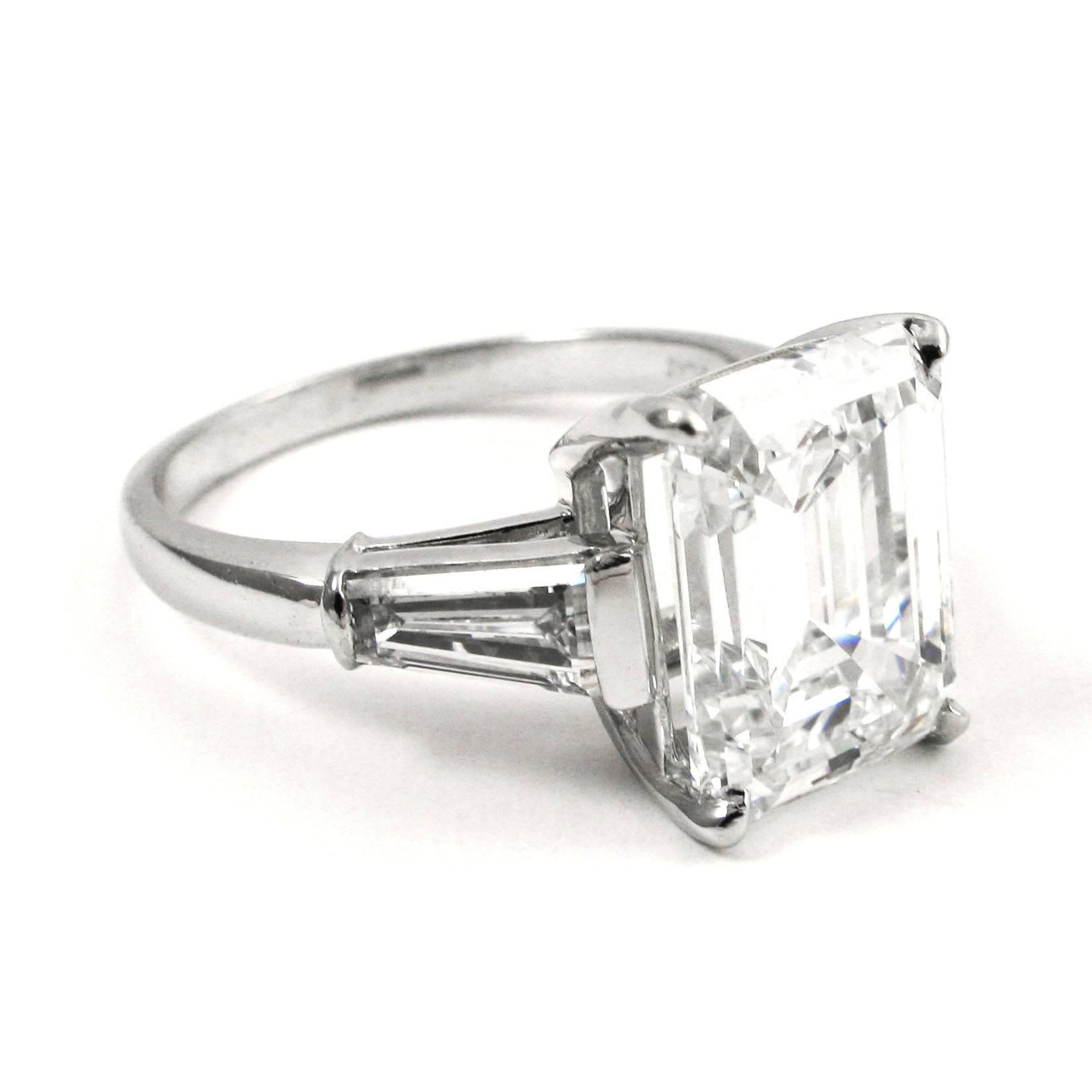 GIA Certified 4.86 Carat Emerald Cut Classic Diamond Platinum Engagement Ring In Excellent Condition In New York, NY