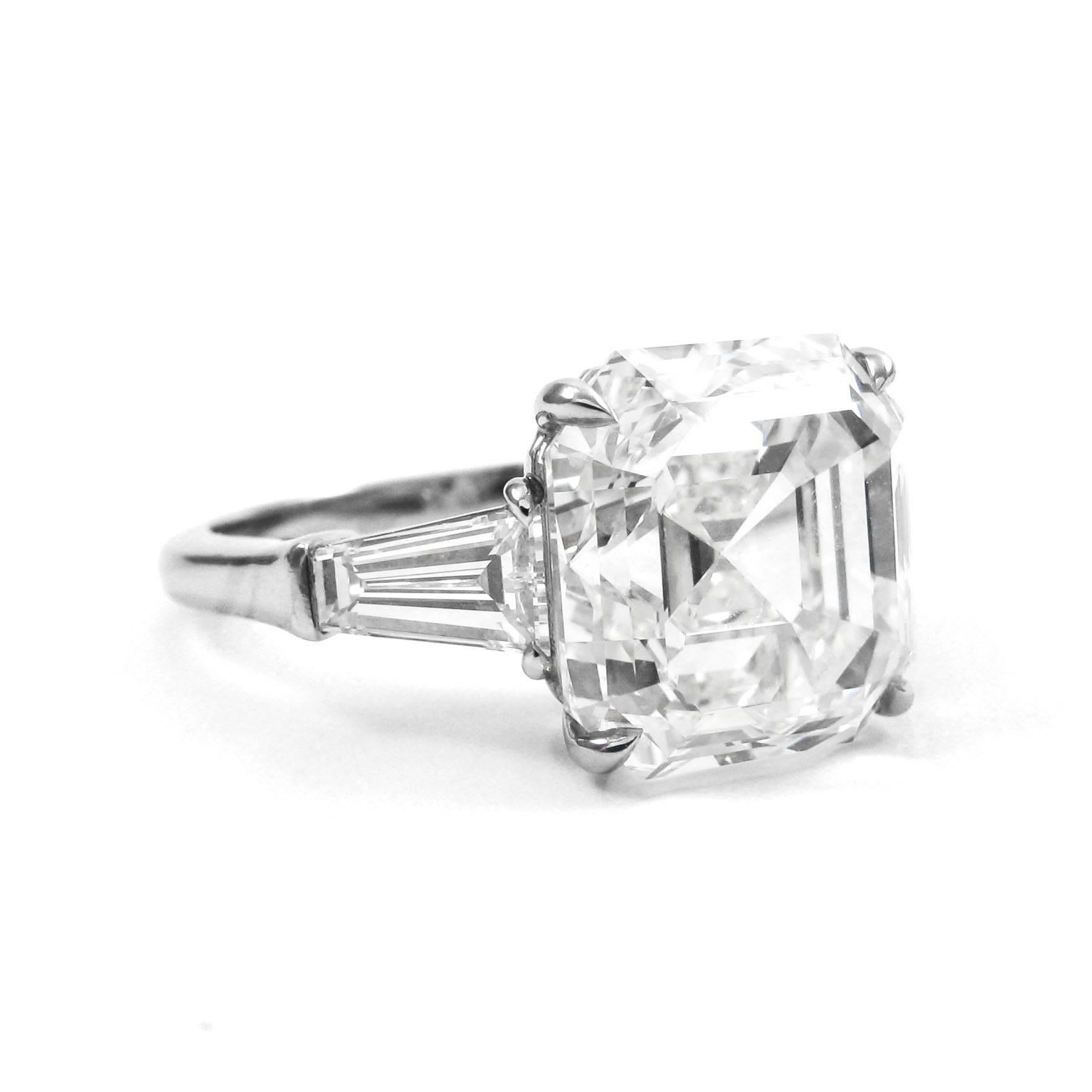 This  elegant and lively Asscher cut diamond is a unique and timeless piece. Less well known than the emerald cut, the Asscher cut is a square step cut with cut corners. This gorgeous 7.00 carat diamond has been certified K color and VS2 clarity by