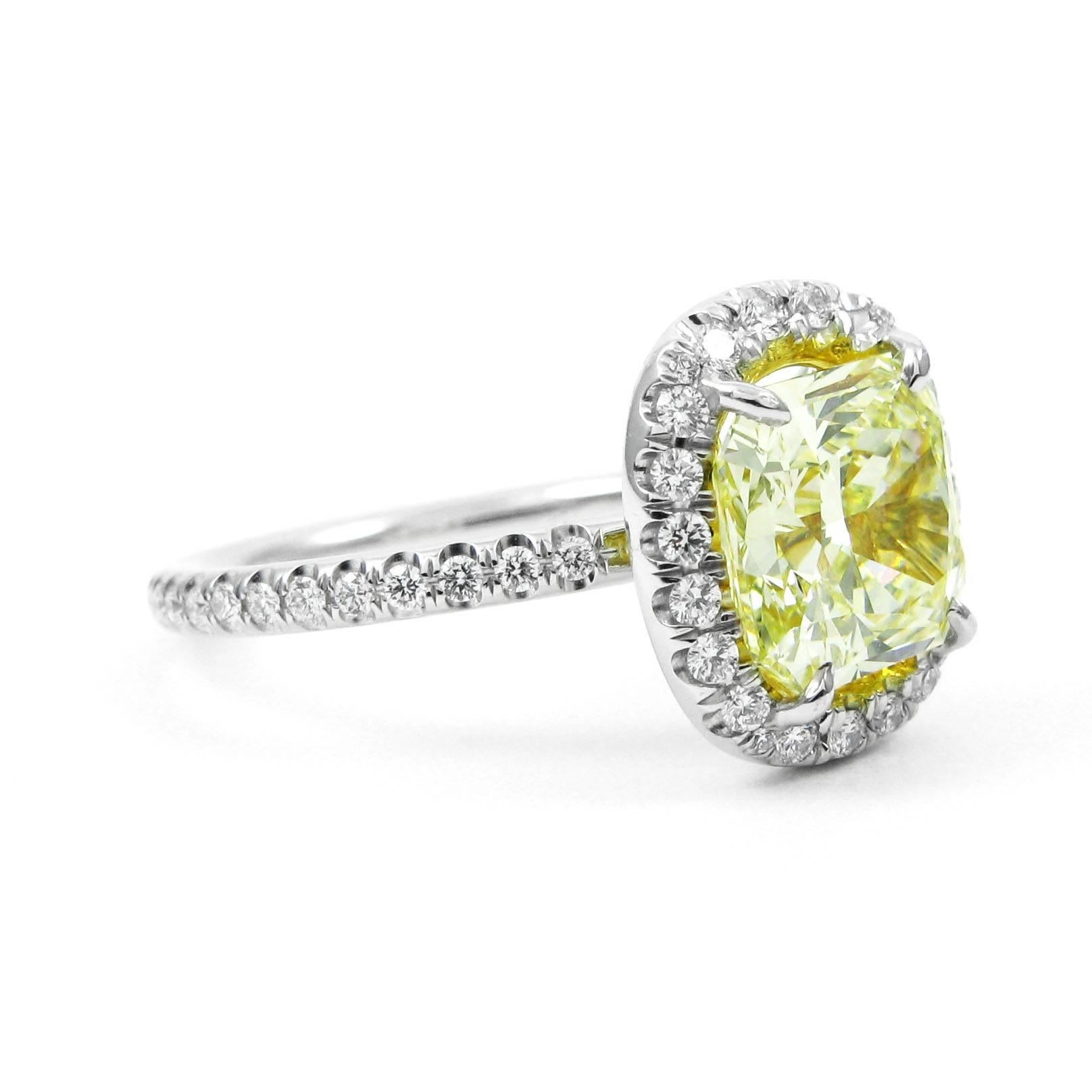 2.39 Carat Fancy Yellow Radiant Cut Diamond Pave Halo Ring In Excellent Condition In New York, NY