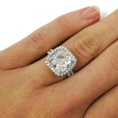 GIA Certified 4.54 Carat Cushion G VS2 Diamond Platinum Pave Halo Ring