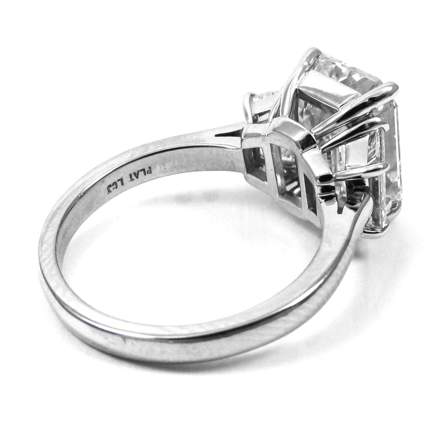 Women's or Men's GIA Certified 4.77 Carat Emerald Cut Platinum Three-Stone Ring