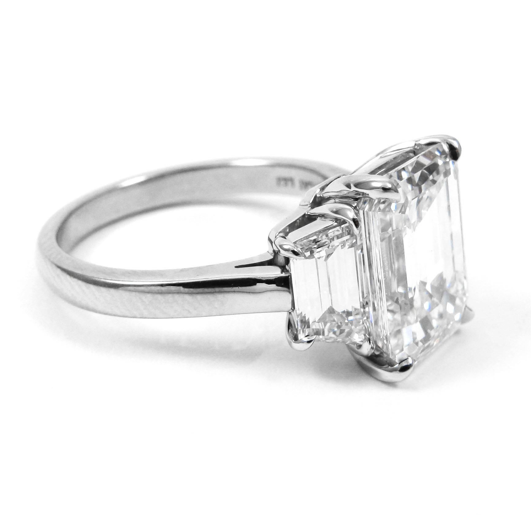 GIA Certified 4.77 Carat Emerald Cut Platinum Three-Stone Ring In Excellent Condition In New York, NY