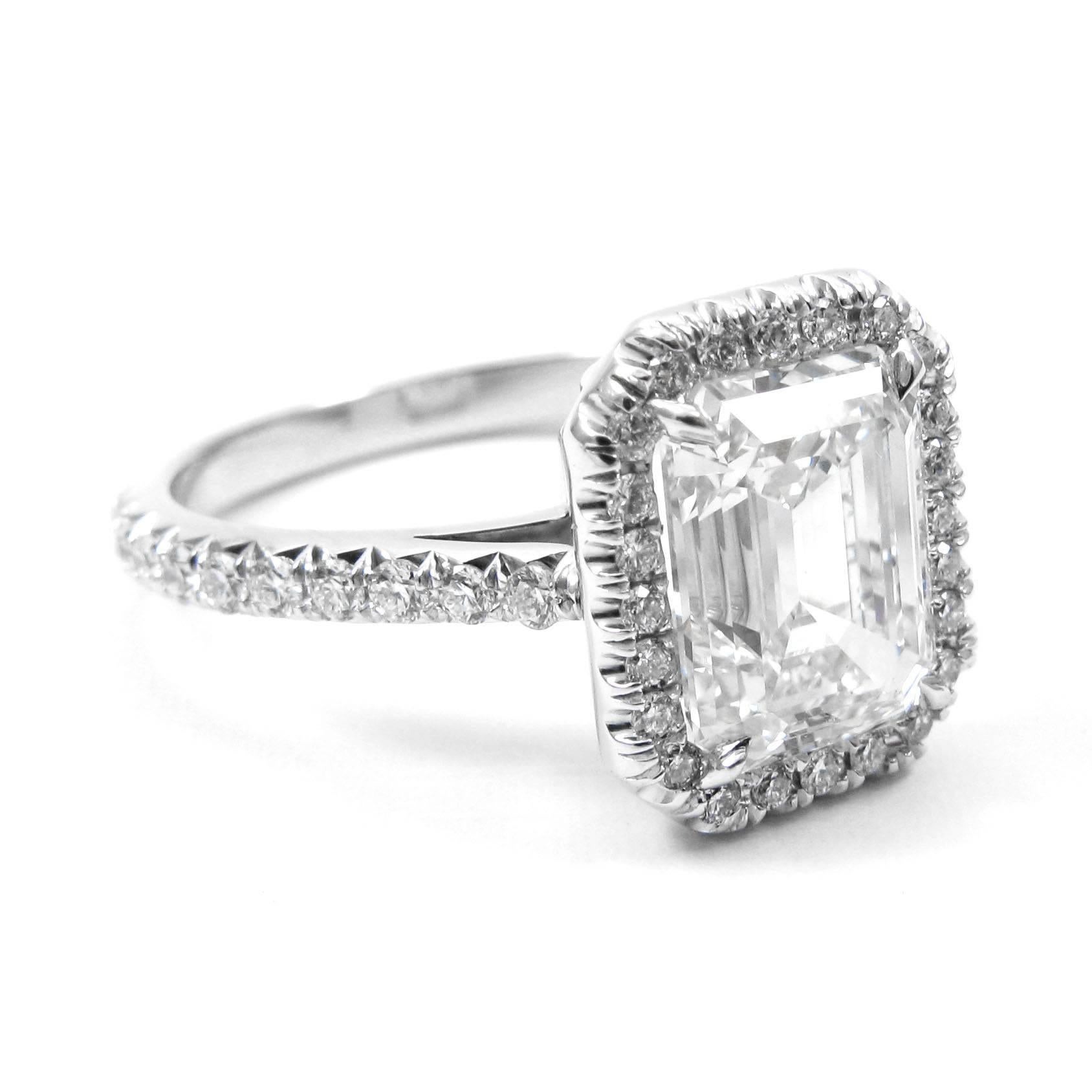 GIA Certified 3.01 Carat Emerald Cut G VS2 Diamond Platinum Pave Halo Ring In Excellent Condition In New York, NY