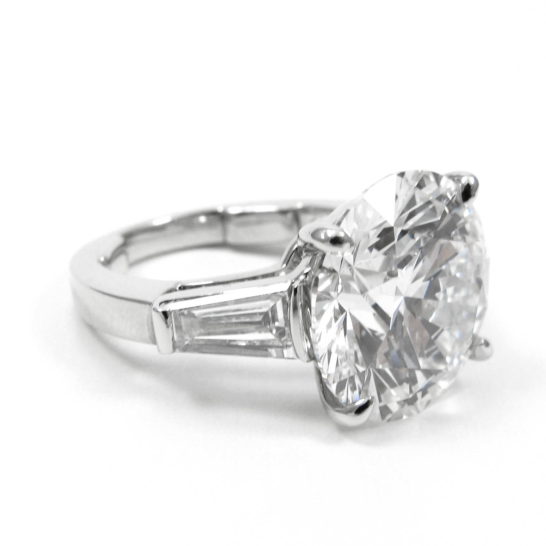 This impressive 8.11 carat round diamond is perfect for anyone looking for statement sparkle! Certified by GIA to be G color, VS1 clarity, and triple excellent cut, this is easily the most brilliant diamond in any room. Set in a classic platinum