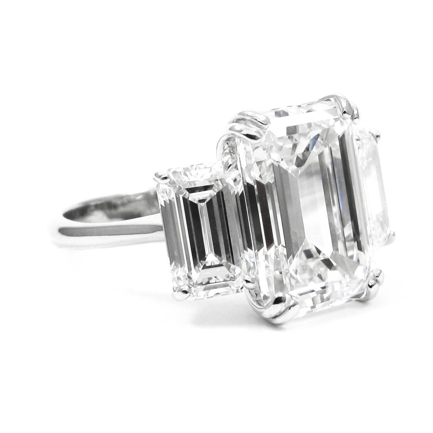7.08 Carat Total Three-Stone Emerald Cut Diamond and Platinum Ring GIA In Excellent Condition In New York, NY