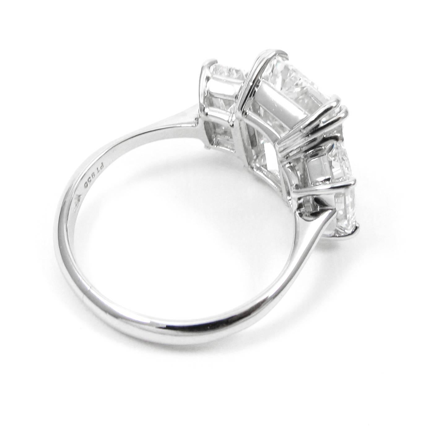 Women's or Men's 7.08 Carat Total Three-Stone Emerald Cut Diamond and Platinum Ring GIA