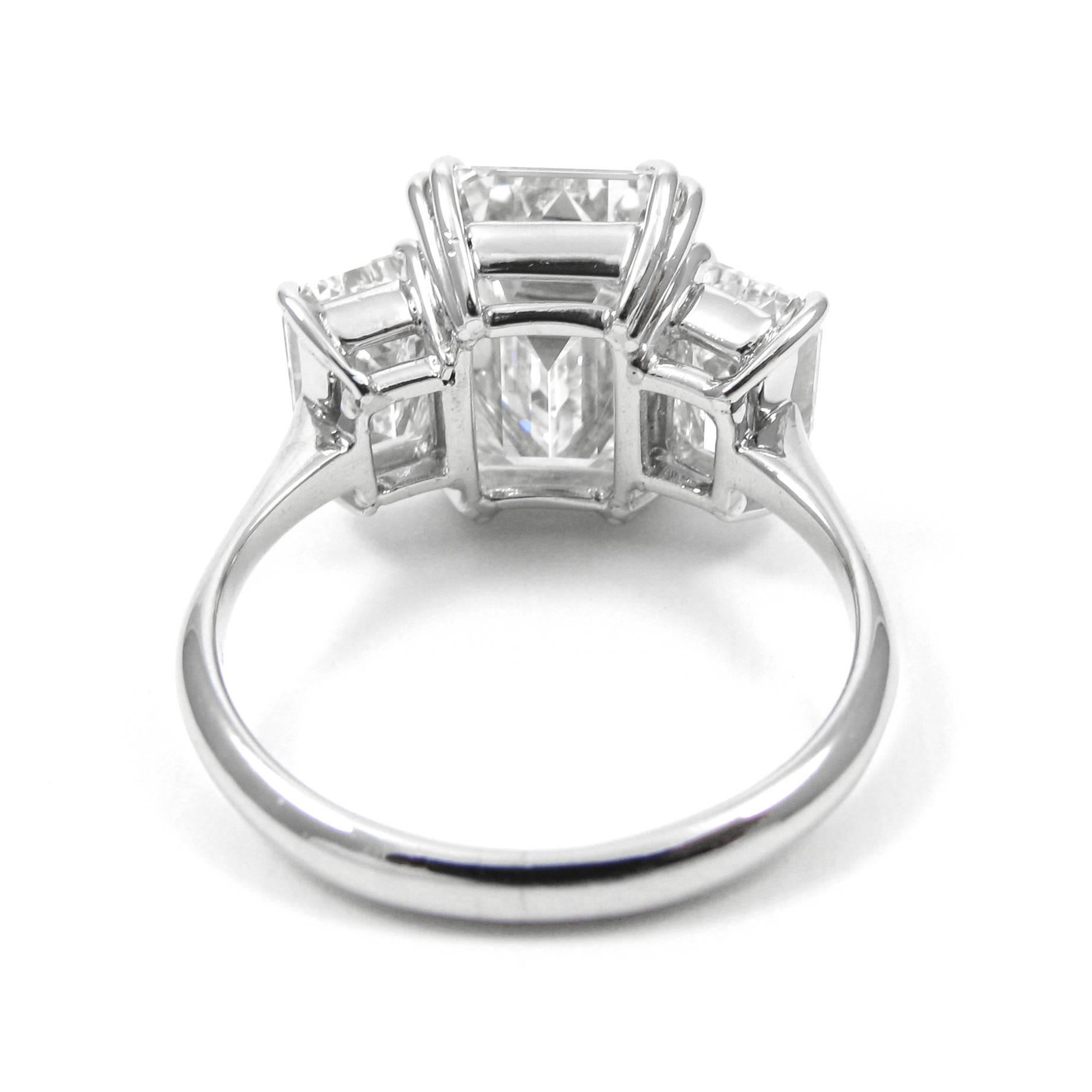 7.08 Carat Total Three-Stone Emerald Cut Diamond and Platinum Ring GIA 1