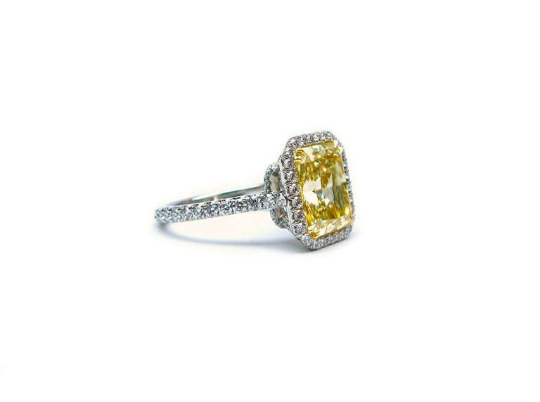 5.38 carat GIA Certified Fancy Light Yellow Radiant Diamond Frame Ring In New Condition In New York, NY