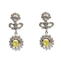 Cathy Carmendy Antique Style Fancy Yellow Oval Diamond Earrings with Bow Detail