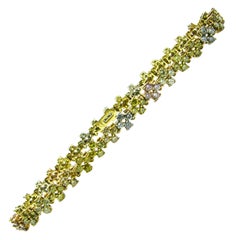 Bracelet tennis en or tricolore avec diamants naturels de couleur fantaisie