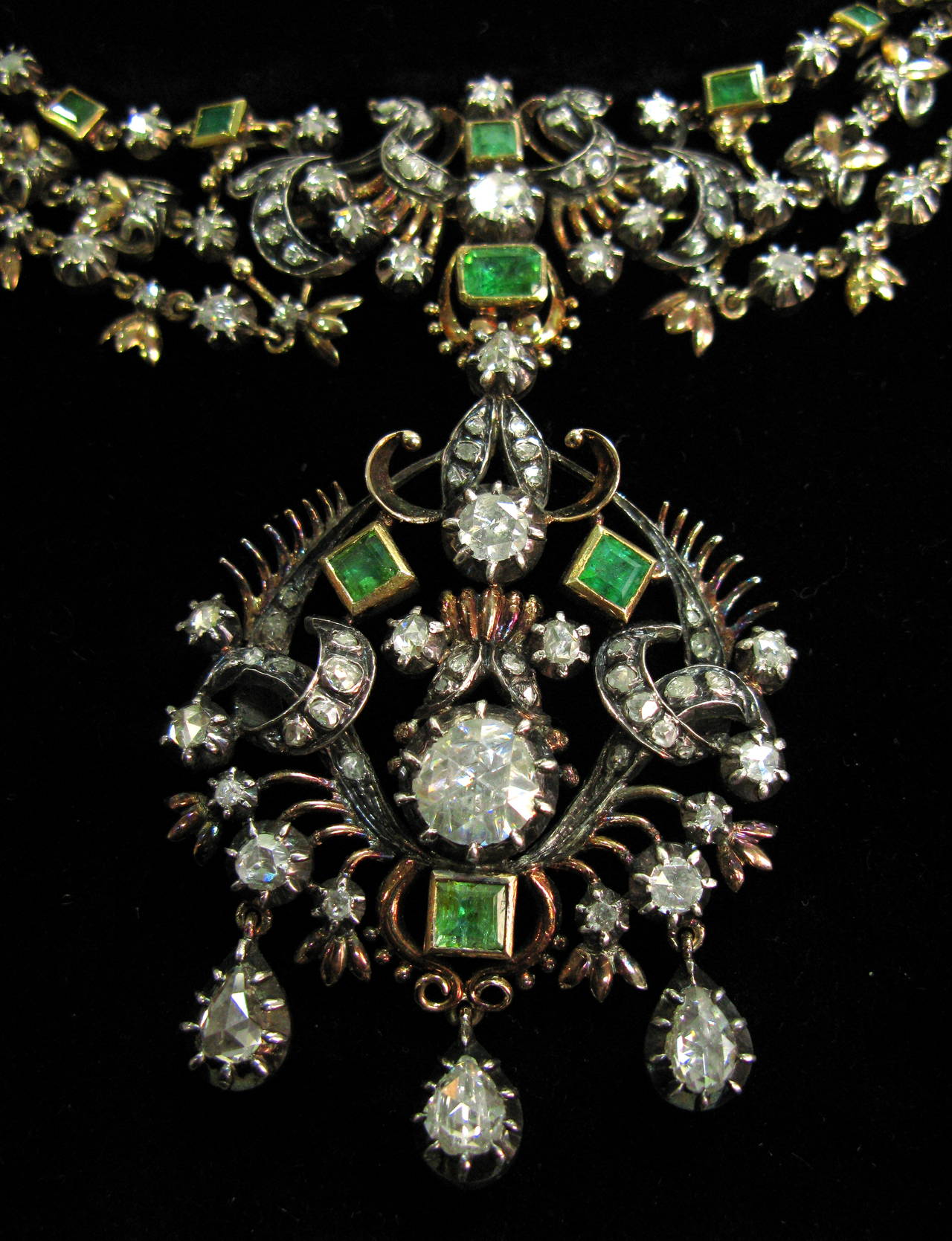 This magnificent piece of jewelry dates back to the 19th century when jewelry was handcrafted with incredibly labor-intensive processes where malleable metal was hammered into intricate designs and patterns. This necklace consists of ornately