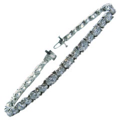 Bracelet tennis en platine avec diamants ovales
