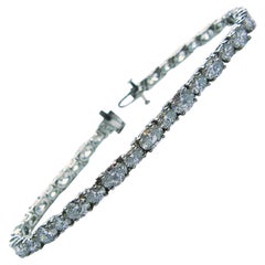 Bracciale tennis in platino con diamanti ovali