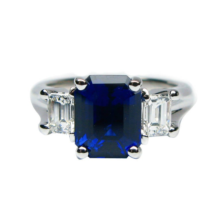 J. Birnbach 3.93 carat Blue Sapphire and Emerald Cut Diamond Three Stone Ring For Sale