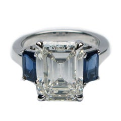 EGL Certified 3.58 Carat Emerald Cut Diamond & Sapphire Three-Stone Ring