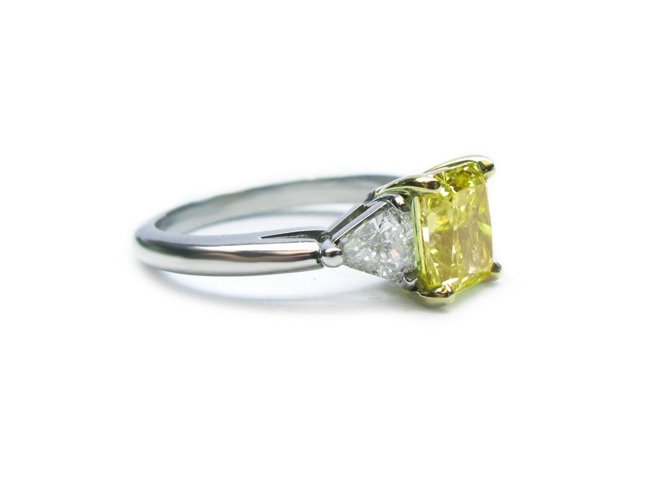 This piece is perfect for a collector with a discerning eye or anyone who loves to stand out in vibrant color! This gorgeous 1.74 carat radiant has been graded Fancy Vivid yellow color and I1 clarity by GIA. The color is beautifully saturated