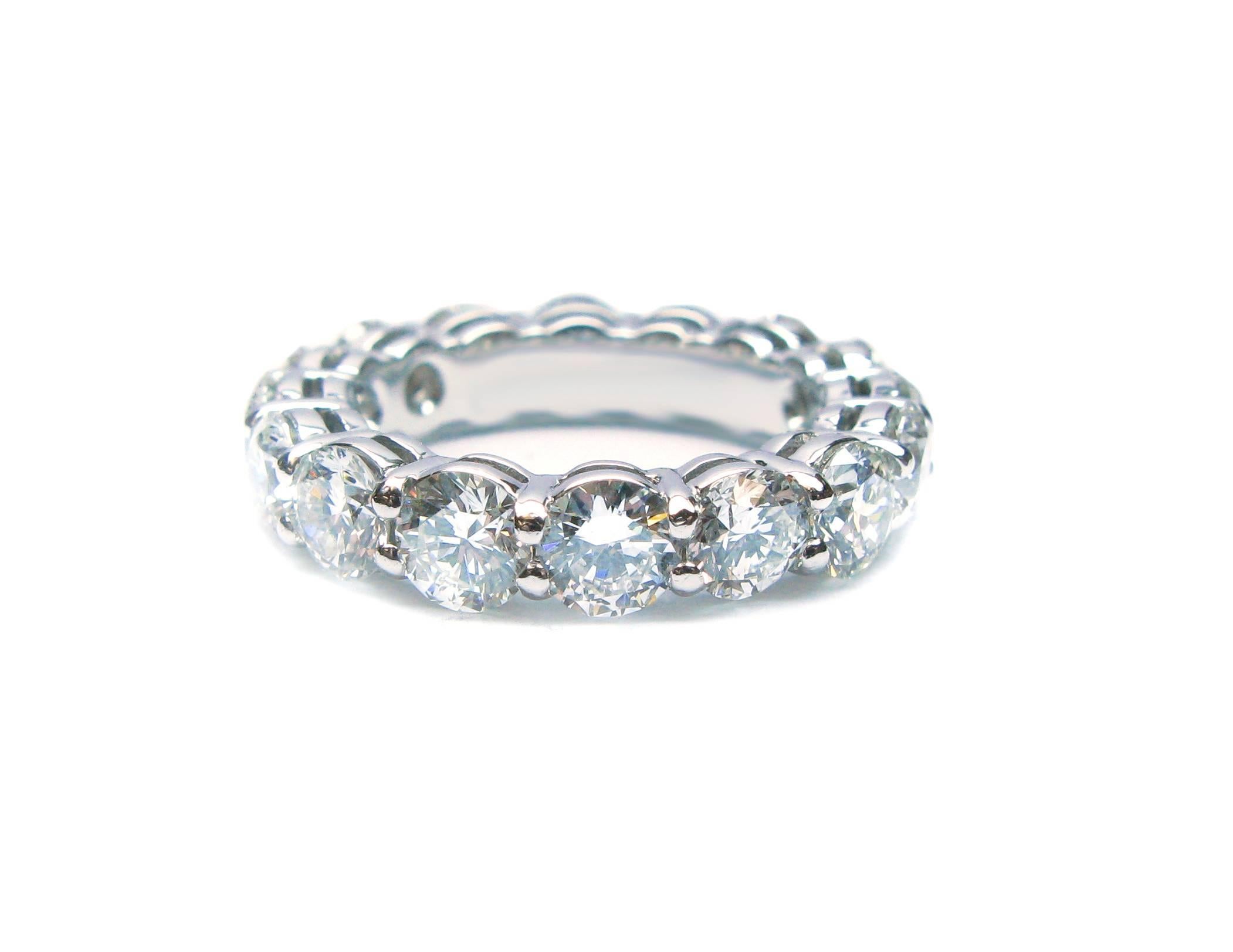 This stunning Graff signed shared prong platinum eternity band features 16 sparkling F/G color, VS clarity, round brilliant diamonds weighing 4.80ctw. A beautiful band to symbolize your love for one another!