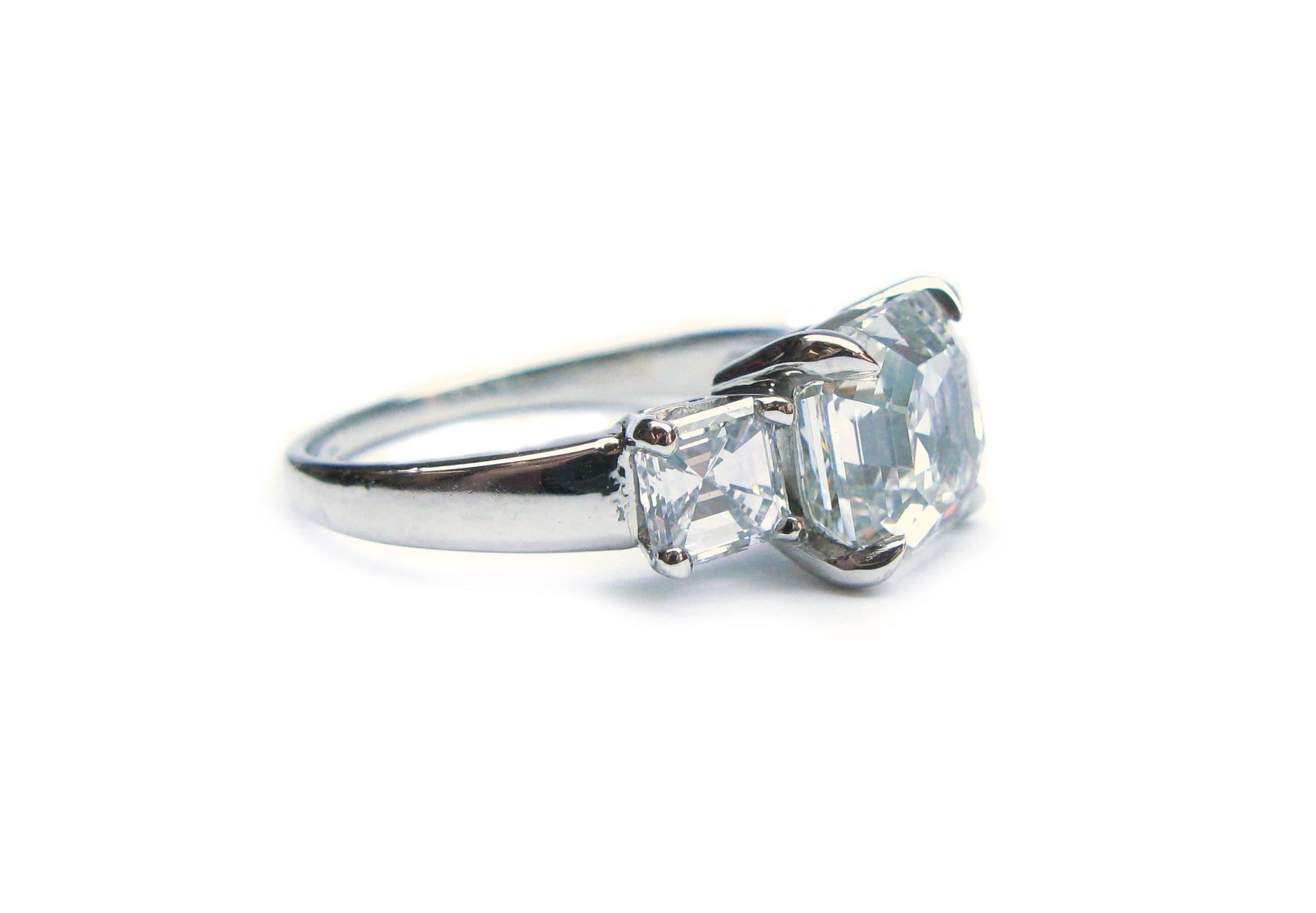 3.01 Carat GIA F VS1 Certified Asscher Diamond Platinum Three Stone Ring In New Condition In New York, NY