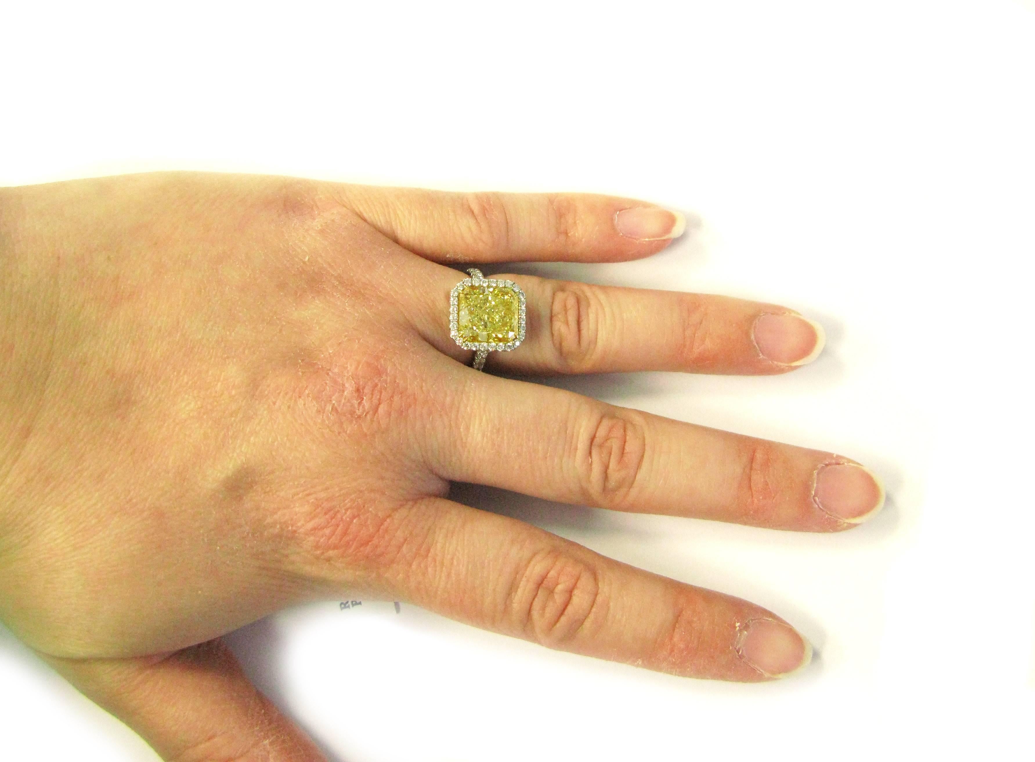 5.38 carat GIA Certified Fancy Light Yellow Radiant Diamond Frame Ring 2