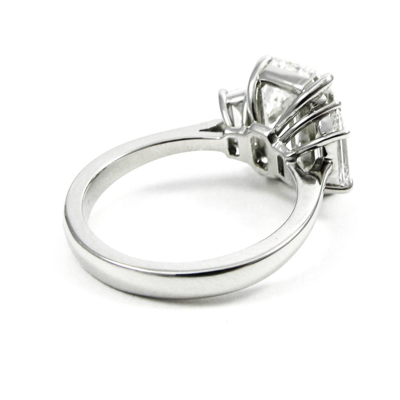 Women's GIA Certified 5.21 Carat Total Emerald Cut Three-Stone Diamond Platinum Ring