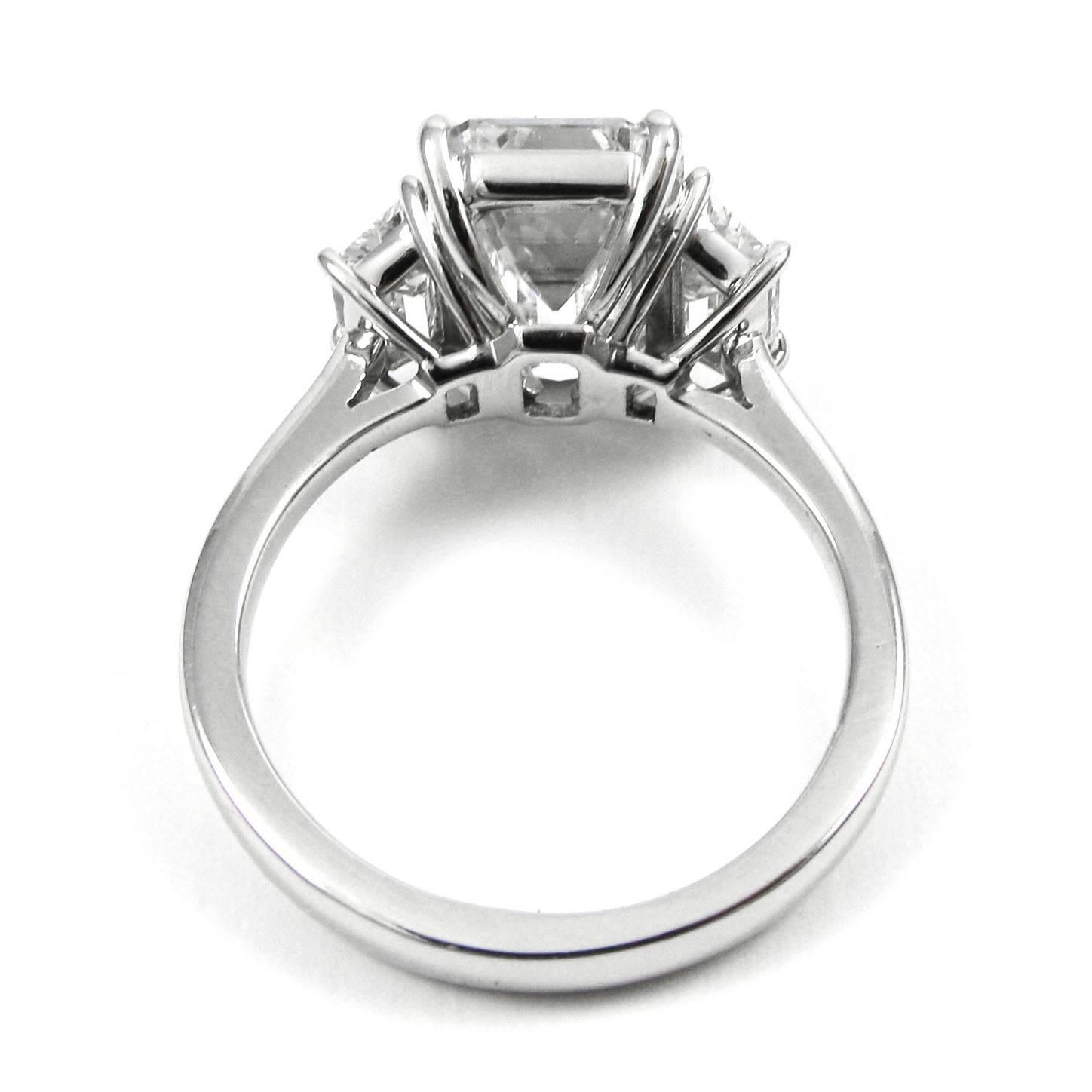 GIA Certified 5.21 Carat Total Emerald Cut Three-Stone Diamond Platinum Ring 1