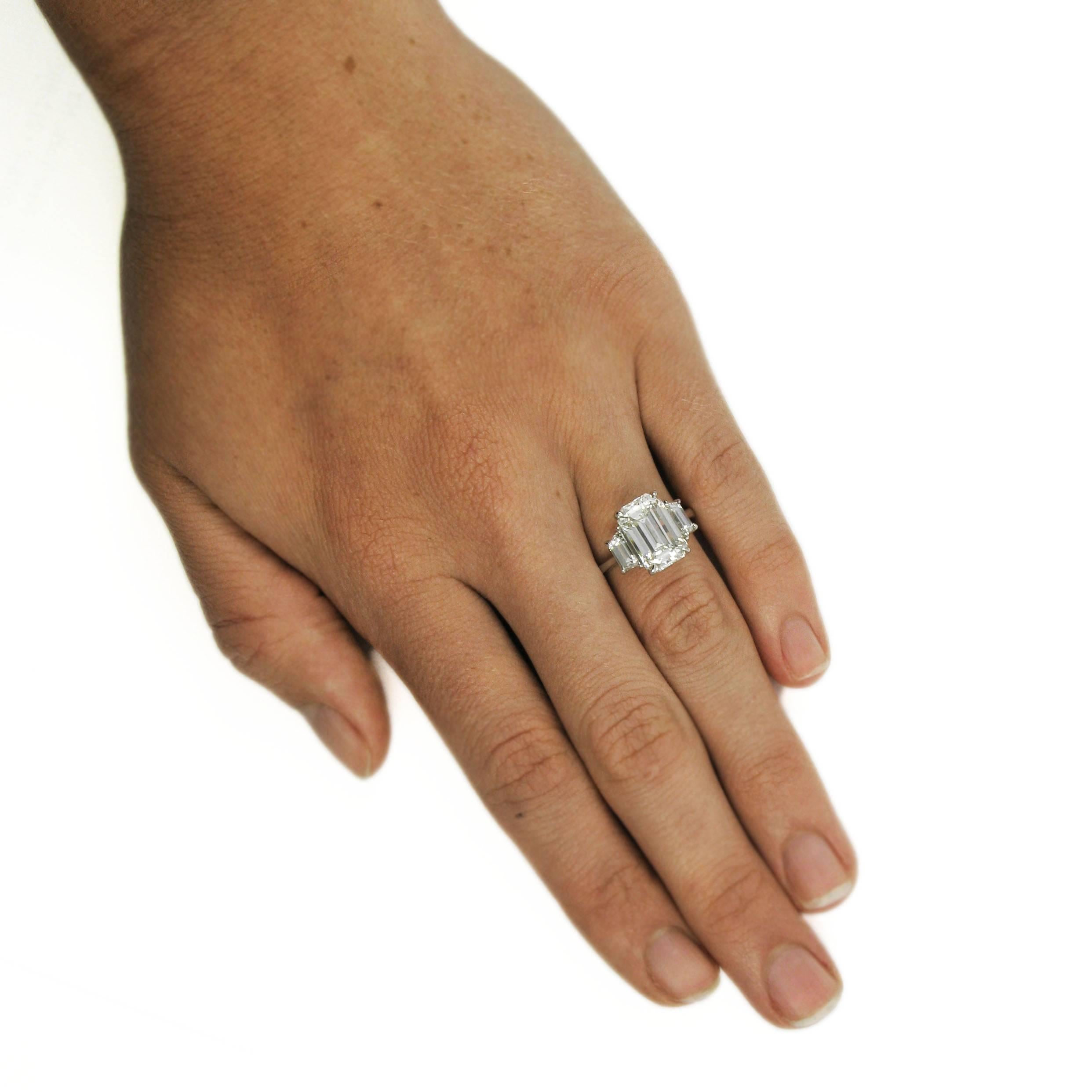 GIA Certified 5.21 Carat Total Emerald Cut Three-Stone Diamond Platinum Ring 2