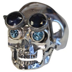 Silver Skull Ring with Sapphire Glasses