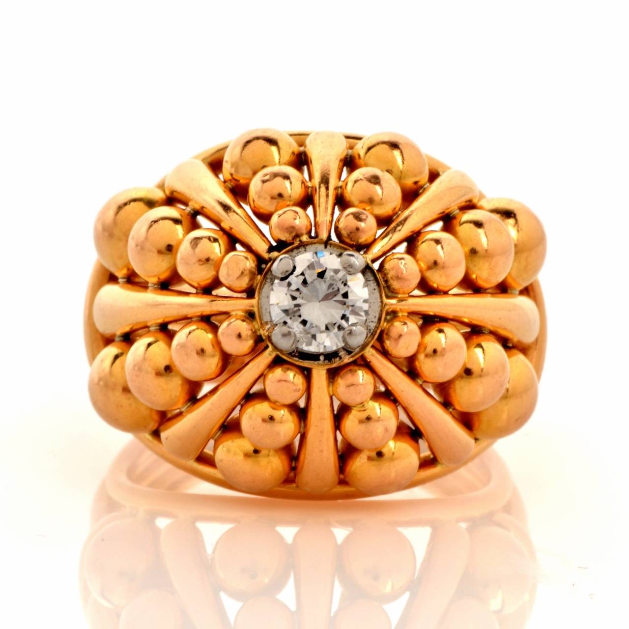 This ring of captivating  dome design and immaculate craftsmanship is handcrafted in solid 18K rose gold, weighing approx. 15.4 grams and 13 mm high. . The artfully designed, pyramidal shape dome plaque exposes at the center a genuine 0.40ct 