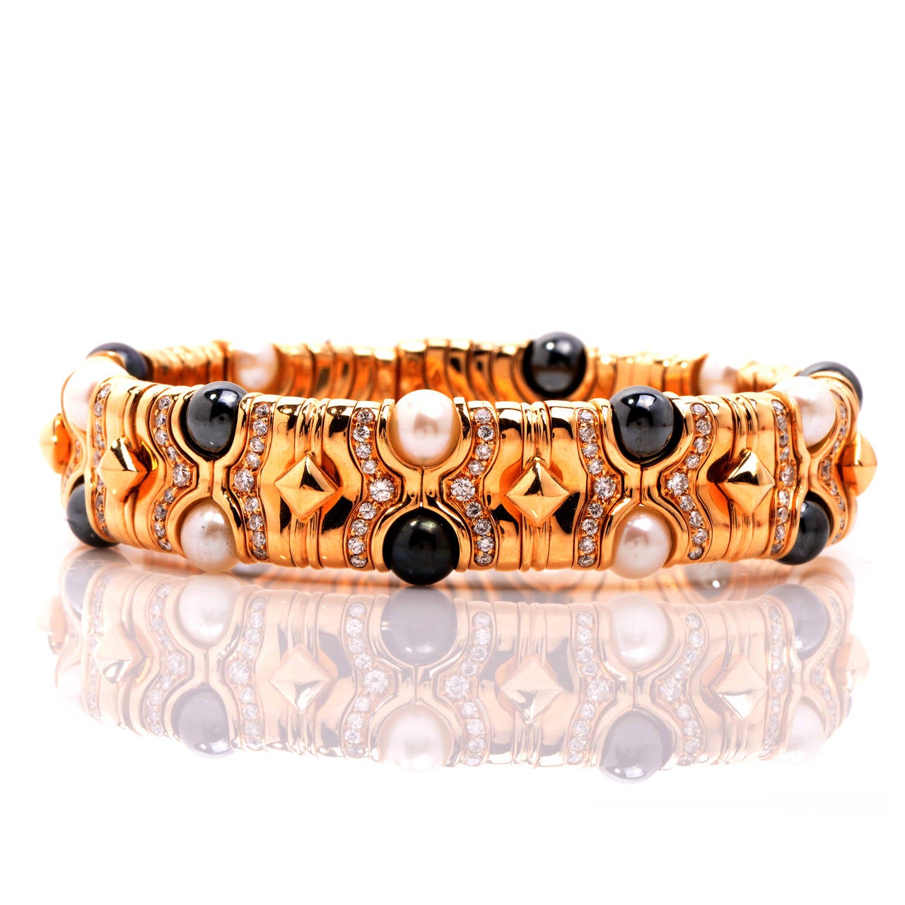 Full of sophistication, elegance and glamour this stunning and exquisitely detailed Bulgari cuff bracelet is a treasure to own! Bulgari is known for gracefully combining the classic with the contemporary, transcending time and trends. Finely crafted