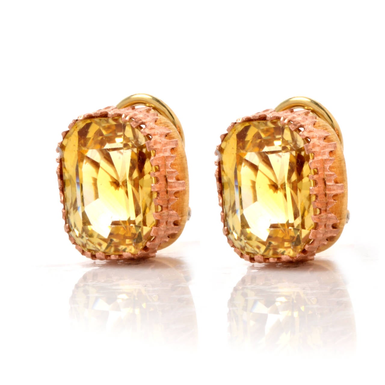 These well-designed clip earrings are  crafted in a combination of  solid 18K  matted yellow and rose gold, weighing approx. 10.7 grams and measuring approx. 14 mm X 10 mm . These earrings are adorned with a pair of antique rectangular cushion