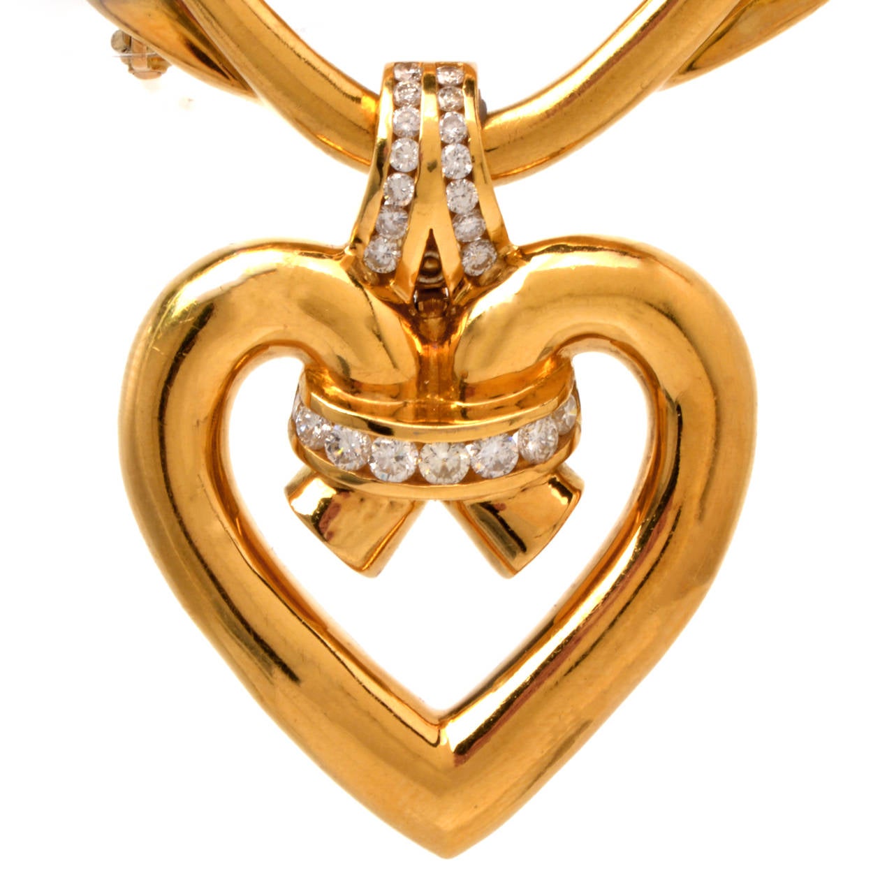 This alluring estate Krypell brooch of distinct aesthetic is crafted in solid 18k yellow gold, weighs approx. 32.1 grams and measures app. 60mm x 50mm.  This exquisite versatile pin could be worn as a heart pendant insert with a gold chain or pearl