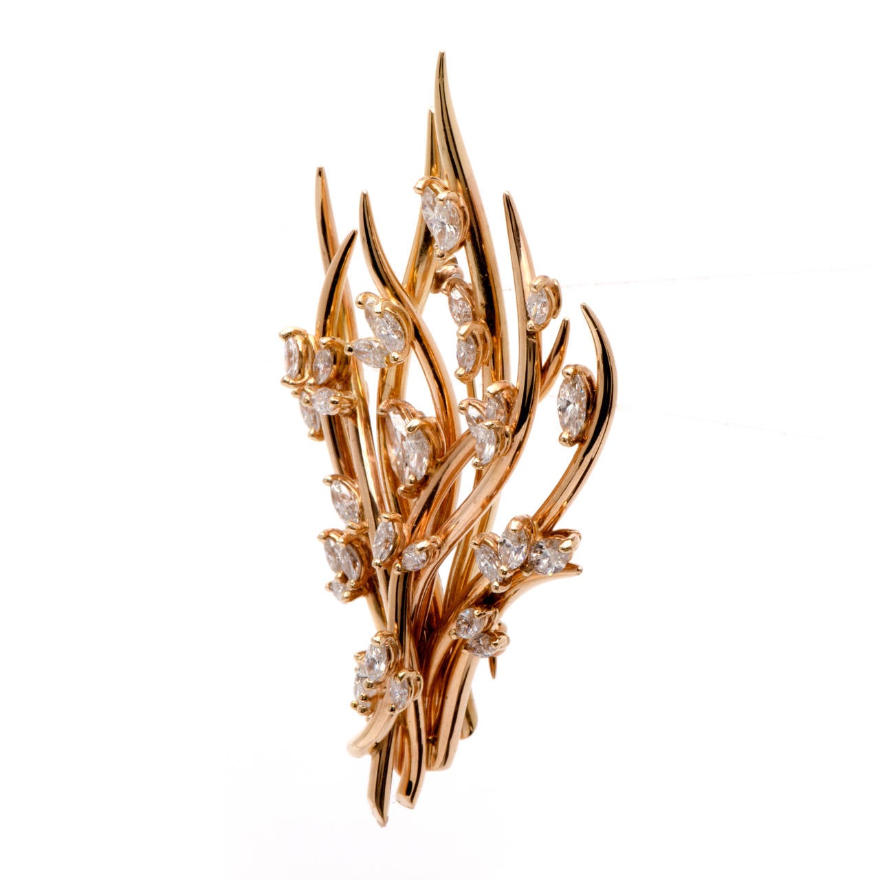 This lovely estate retro diamond branch design pin is crafted in solid 18K rose gold. This stunning pin is adorned with some 37 genuine marquise diamonds approx 6.00cts, H-I color, VS clarity, prong set. This item is in excellent